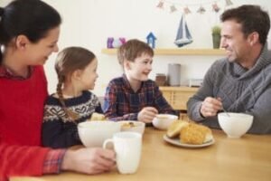 a family having some soup for lunch