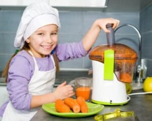 little girl making a fresh drink