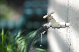 hose attached to water spigot