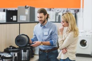 sales clerk and customer in appliance store