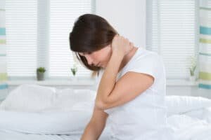 young woman with neck pain