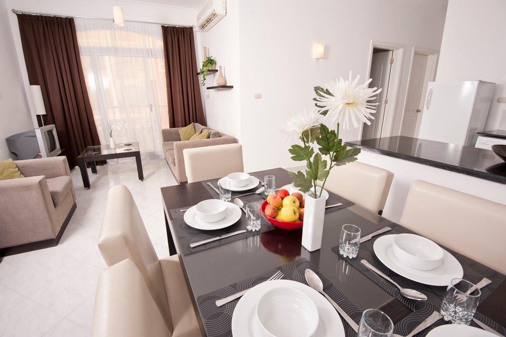 how to fit a dining table in a small living room