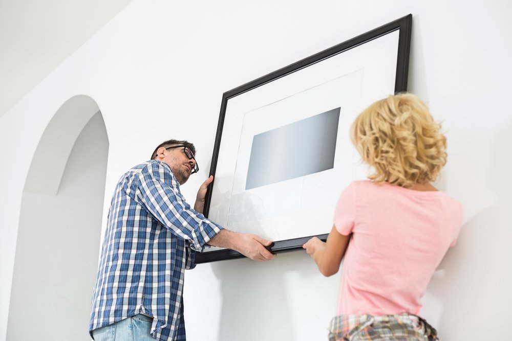 how to hang pictures without nails